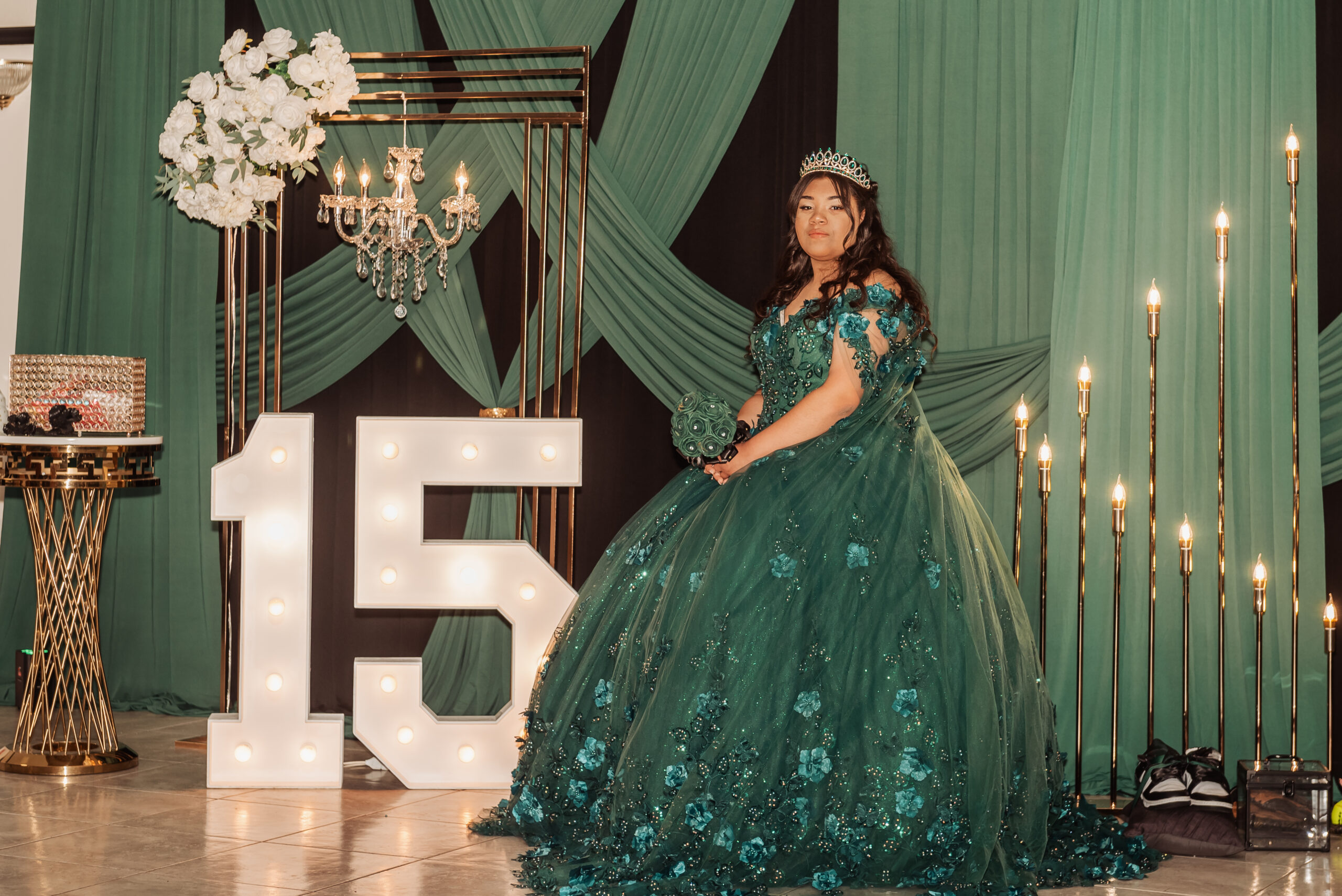 CT quinceañera photography girl in green ball gown tiara marquee 15 chandelier